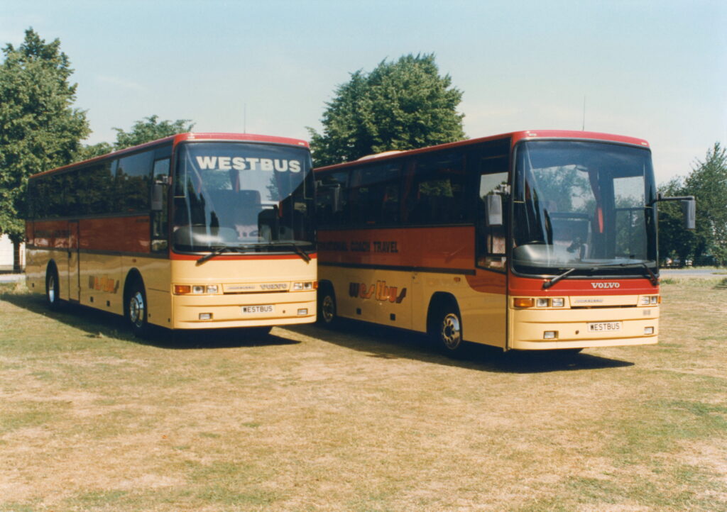 M727 KJU, 1995 Volvo B10M Jonckheere Deauville, and M726 KJU, 1995 Volvo B6R Jonckheere Midi.